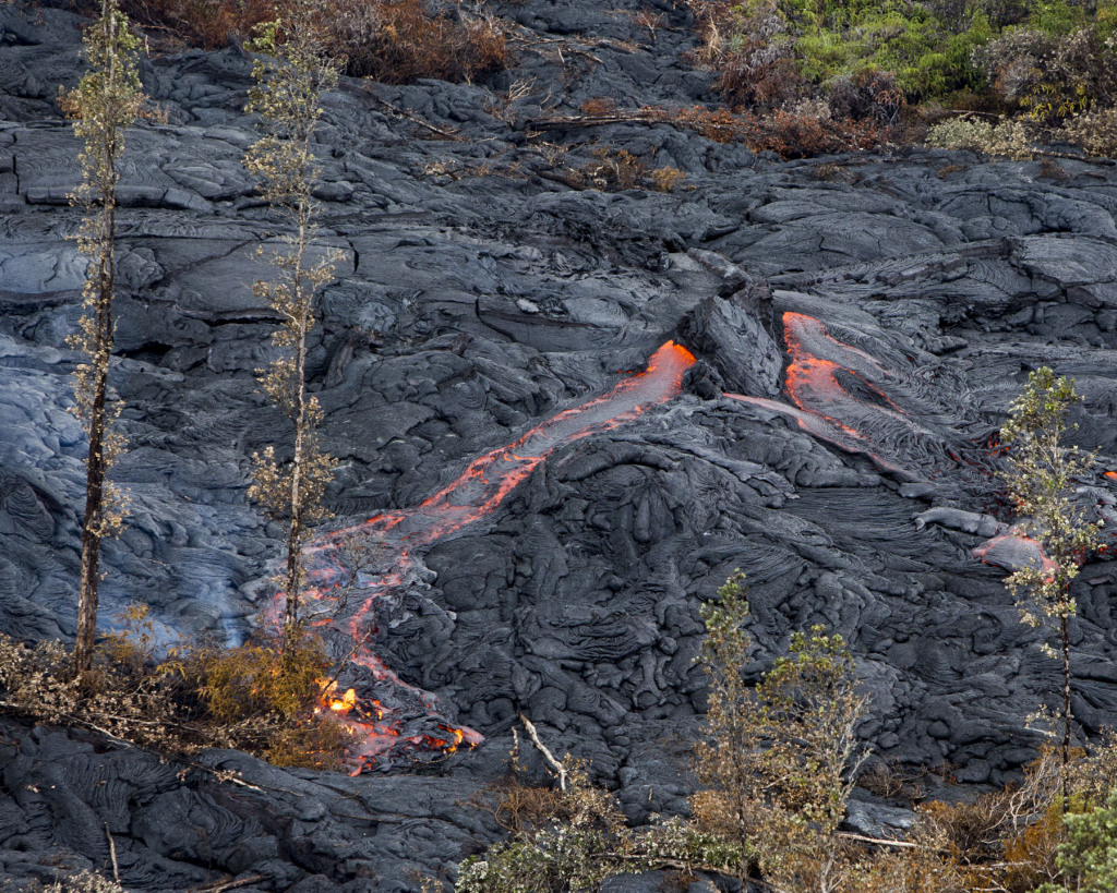 Lava spouts from a hot spot as the lava flow from Mt. Kilauea inches closer to the village of Pahoa, Hawaii